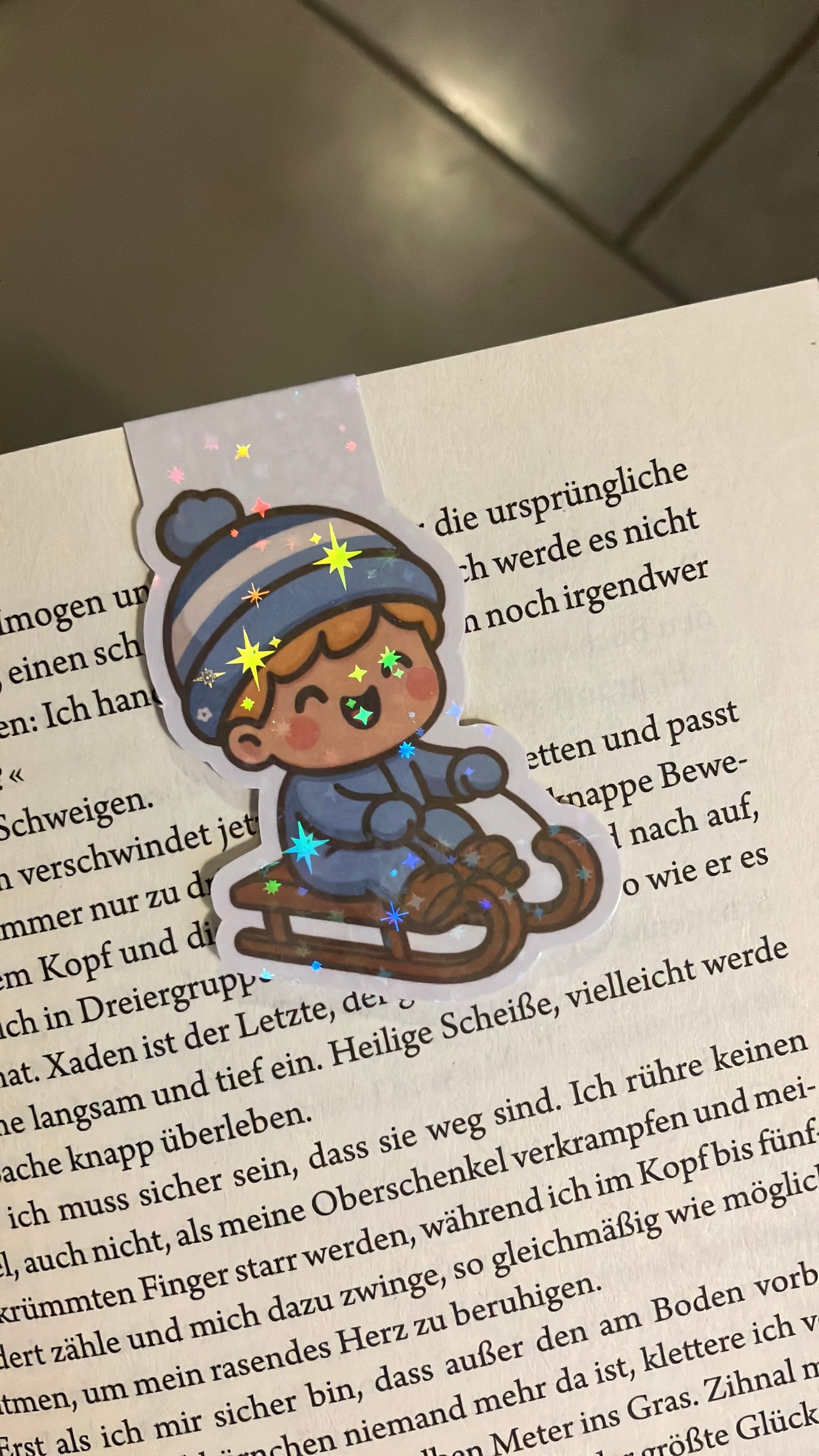 Lesezeichen Magnetisch Junge auf Schlitten
